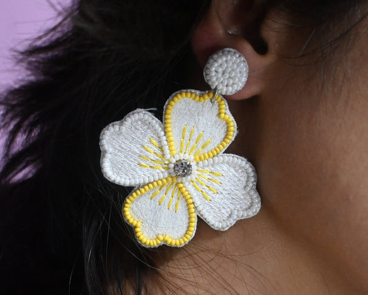 white and yellow handmade flower