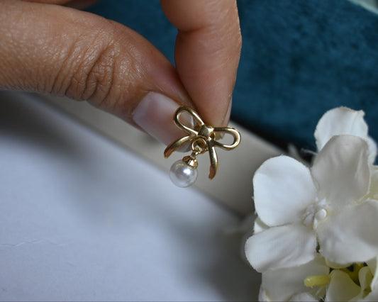 Bow with pearl drop