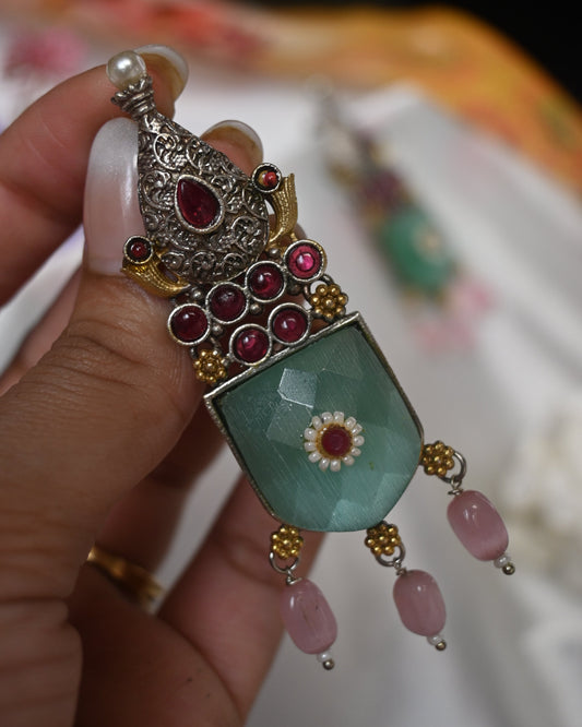 turquoise ethnic with pink tessels