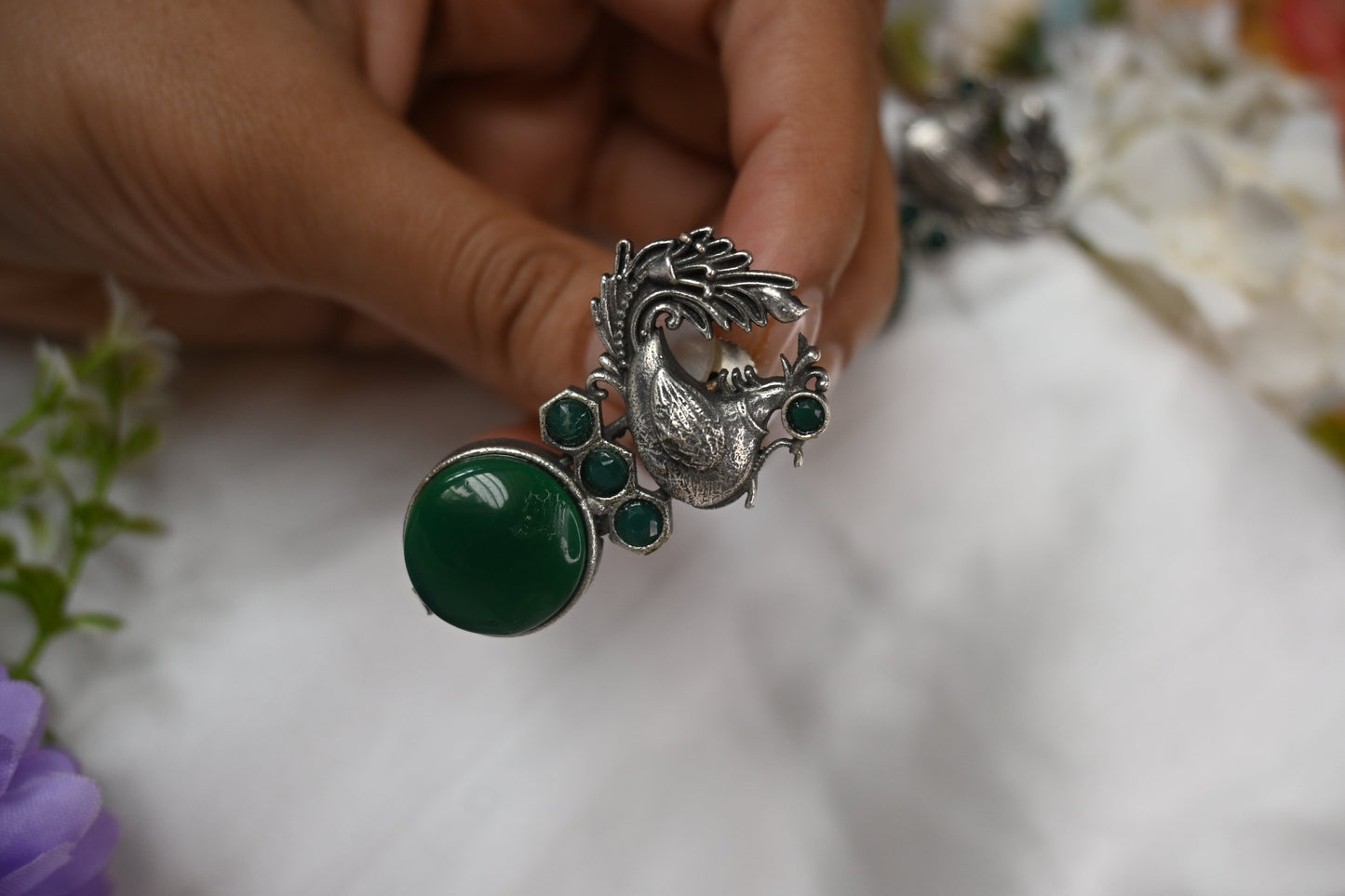 peacock studs