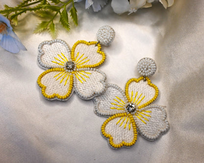 white and yellow handmade flower