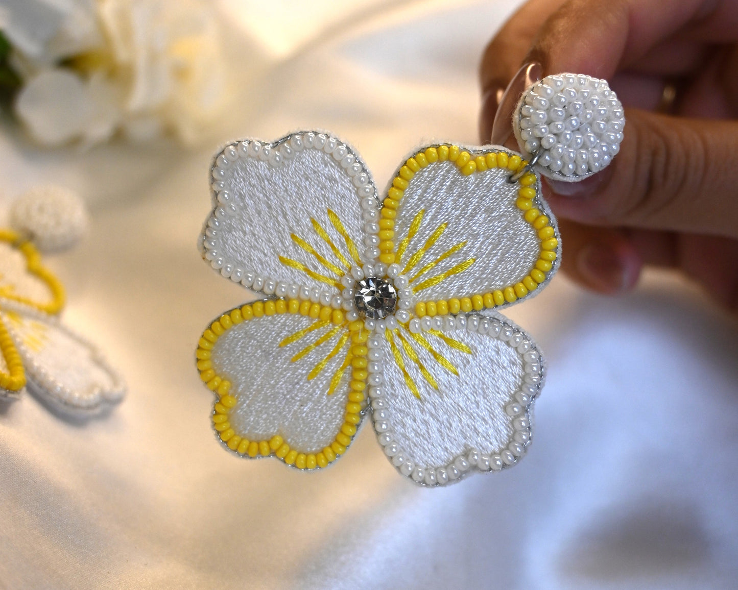 white and yellow handmade flower